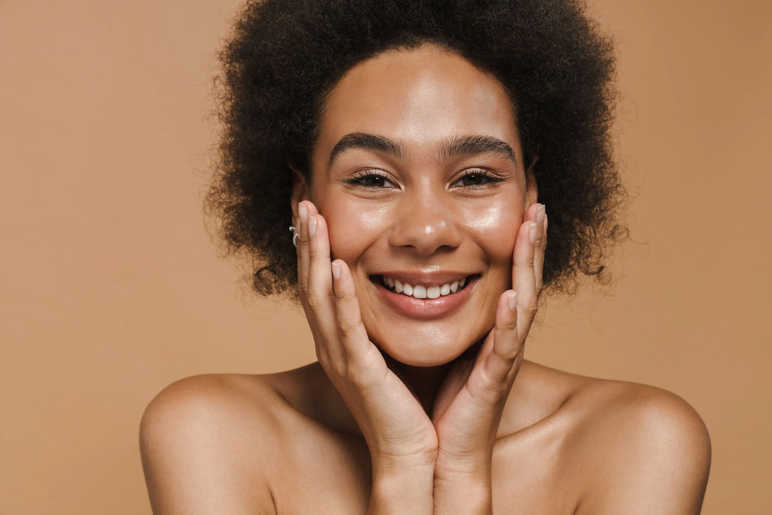 Woman with glowing skin smiling